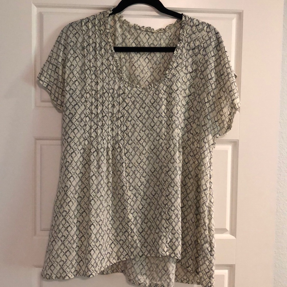 Ivory and navy blouse
